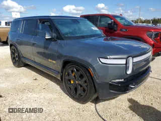 2024 Rivian R1S Adventure with VIN 7PDSGABA4RN031387, listed as a Copart auction lot 75098504 with Not Provided miles and Salvage Title. Bid and sale history available at carsss.com. Image 4.