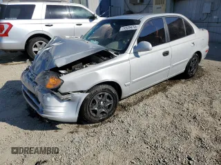 2004 Hyundai Accent GL with VIN KMHCG45C74U550647, listed as a Copart auction lot 74526474 with 115,838 mi miles and Salvage Title. Bid and sale history available at carsss.com. Image 1.