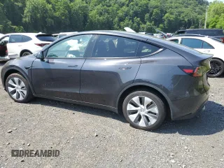 2024 Tesla Model Y с VIN 7SAYGDED1RF092027, выставлен на аукционе Copart как лот 62330775 с пробегом 22 010 миль миль и Списание • Salvage title. История ставок и продаж доступна на DreamBid. Изображение 2.