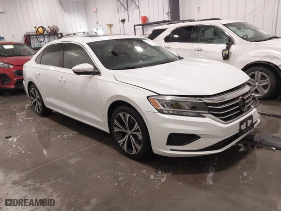 2021 Volkswagen Passat 2.0T SE with VIN 1VWSA7A37MC017676, listed as a IAAI auction lot 41647899 with 40,404 mi miles. Bid and sale history available at carsss.com. Image 1.