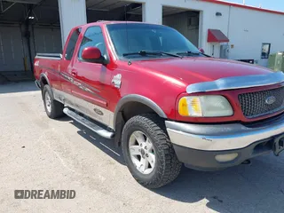 2002 Ford F-150 XL with VIN 1FTRX18L72NB09679, listed as a IAAI auction lot 42542526 with Not provided miles and . Bid and sale history available at DreamBid. Image 1.