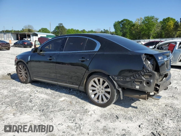 2011 Lincoln MKS with VIN 1LNHL9DR7BG615397, listed as a Copart auction lot 52047015 with 111,720 mi miles and Salvage Title. Bid and sale history available at DreamBid. Image 2.