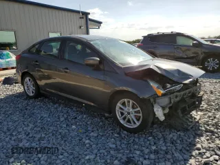 2018 Ford Focus SE with VIN 1FADP3F2XJL254344, listed as a Copart auction lot 54663115 with 84,850 mi miles and Salvage title. Bid and sale history available at DreamBid. Image 4.