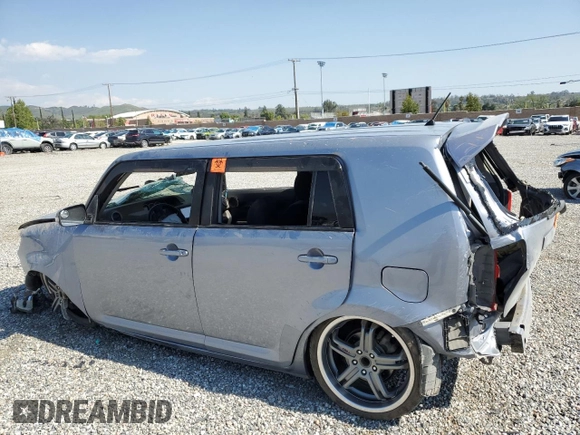 2012 Scion xB with VIN JTLZE4FE4C1142972, listed as a Copart auction lot 54974165 with 184,238 mi miles and Salvage Title. Bid and sale history available at DreamBid. Image 2.