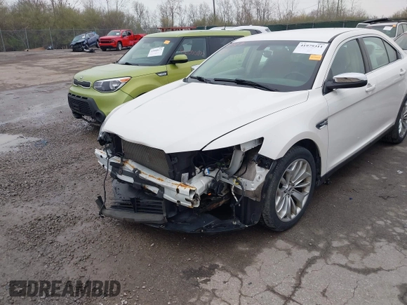 2015 Ford Taurus Limited with VIN 1FAHP2F85FG117635, listed as a IAAI auction lot 41979311 with 104,314 mi miles. Bid and sale history available at carsss.com. Image 6.