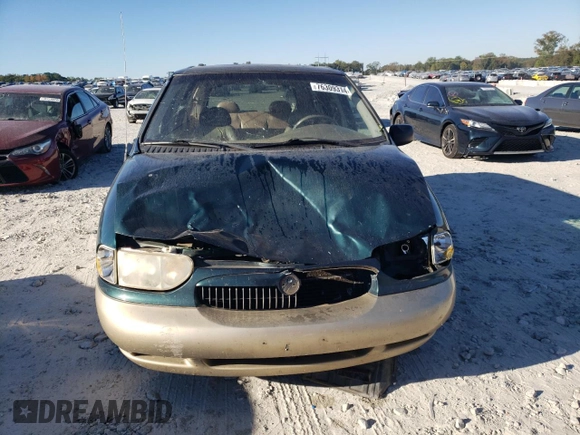 1999 Mercury Villager z VIN 4M2XV11T4XDJ15941, wystawiony jako Copart lot #76309314 z przebiegiem 158 003 mil mil oraz Szkoda całkowita • Salvage title. Historia ofert i sprzedaży dostępna na DreamBid. Obrazek 5.