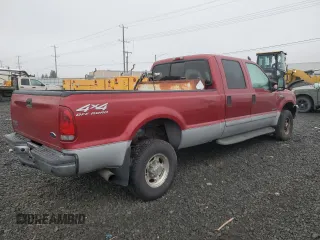 2002 Ford F-350 XL with VIN 1FTSW31FX2EC73836, listed as a Copart auction lot 82403774 with 188,898 mi miles and Salvage title. Bid and sale history available at DreamBid. Image 4.