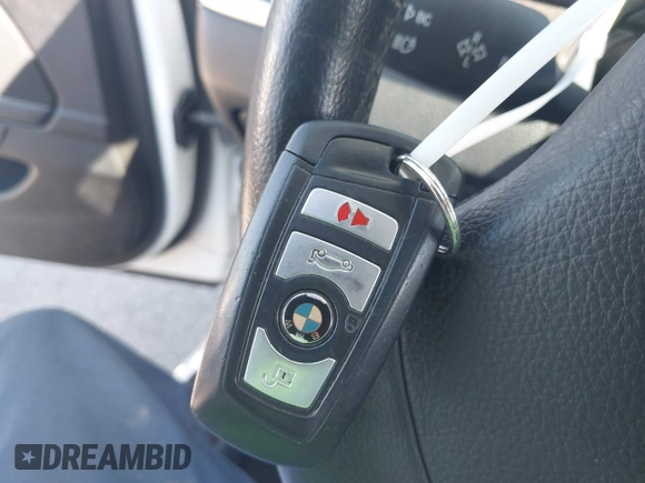 2014 BMW 5 Series 528i with VIN WBA5A5C55ED500014, listed as a IAAI auction lot 41835309 with 114,436 mi miles and . Bid and sale history available at DreamBid. Image 11.