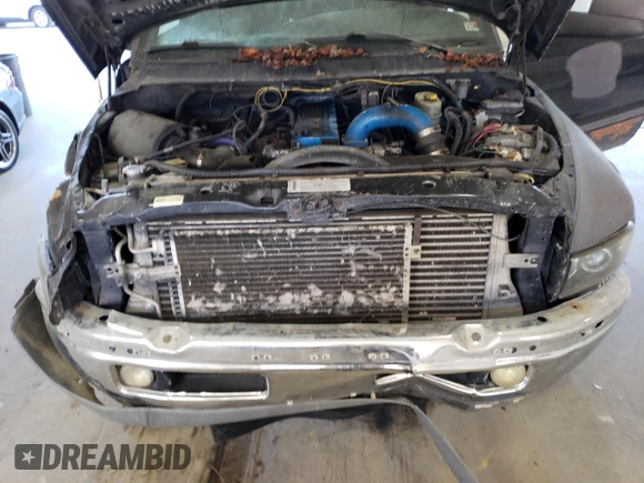 2002 Dodge Ram 2500 with VIN 3B7KF23C82M255391, listed as a Copart auction lot 73115584 with 216,242 mi miles and Salvage Title. Bid and sale history available at carsss.com. Image 11.