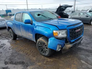 2021 GMC Canyon 4WD Elevation with VIN 1GTG6CEN1M1245554, listed as a IAAI auction lot 41099627 with 46,626 mi miles. Bid and sale history available at carsss.com. Image 1.