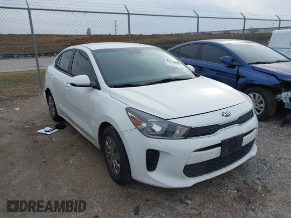 2019 Kia Rio S with VIN 3KPA24ABXKE215756, listed as a IAAI auction lot 41556461 with 122,300 mi miles. Bid and sale history available at carsss.com. Image 1.