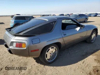 1985 Porsche 928 z VIN WP0JB0927FS862258, wystawiony jako Copart lot #71369064 z przebiegiem 32 896 mil mil oraz Szkody całkowita. Historia ofert i sprzedaży dostępna na DreamBid. Obrazek 3.