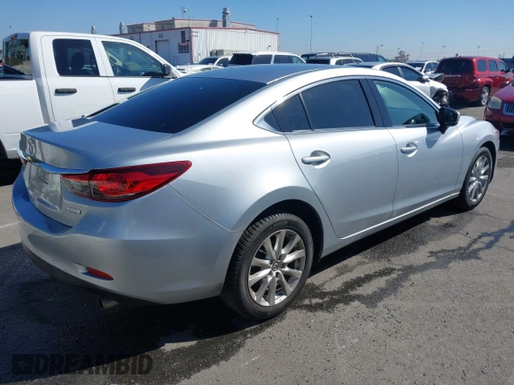 2017 Mazda Mazda6 Sport with VIN JM1GL1U5XH1121285, listed as a IAAI auction lot 41868295 with 87,045 mi miles. Bid and sale history available at carsss.com. Image 4.
