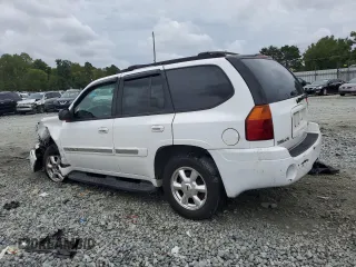 2005 GMC Envoy SLT with VIN 1GKDS13S652330496, listed as a Copart auction lot 73317234 with 191,138 mi miles and Salvage Title. Bid and sale history available at carsss.com. Image 2.