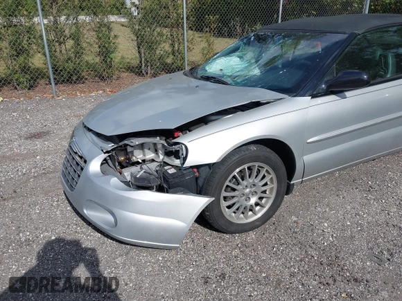 2004 Chrysler Sebring LXi z VIN 1C3EL55R44N258455, wystawiony jako IAAI lot #42108552 z przebiegiem 113 216 mil mil oraz . Historia ofert i sprzedaży dostępna na DreamBid. Obrazek 6.