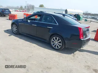 2012 Cadillac CTS Luxury with VIN 1G6DE5E56C0151579, listed as a IAAI auction lot 41717449 with 116,938 mi miles and . Bid and sale history available at DreamBid. Image 3.