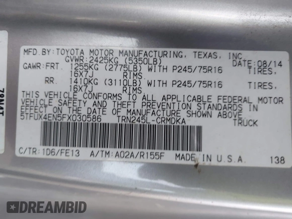 2015 Toyota Tacoma with VIN 5TFUX4EN5FX030586, listed as a IAAI auction lot 41034603 with 153,923 mi miles and . Bid and sale history available at DreamBid. Image 9.