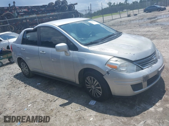 2011 Nissan Versa S with VIN 3N1BC1AP4BL446596, listed as a IAAI auction lot 42425302 with 141,047 mi miles and . Bid and sale history available at DreamBid. Image 1.