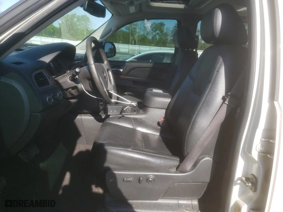 2013 GMC Sierra 1500 SLT with VIN 3GTP2WE70DG252706, listed as a Copart auction lot 52069795 with 145,677 mi miles and Salvage Title. Bid and sale history available at carsss.com. Image 7.