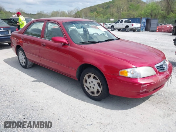 2000 Mazda 626 LX with VIN 1YVGF22C8Y5115891, listed as a IAAI auction lot 42121137 with 186,165 mi miles. Bid and sale history available at carsss.com. Image 1.