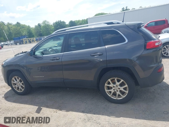 2016 Jeep Cherokee Latitude z VIN 1C4PJMCB4GW241454, wystawiony jako IAAI lot #42378181 z przebiegiem 210 207 mil mil oraz . Historia ofert i sprzedaży dostępna na DreamBid. Obrazek 14.