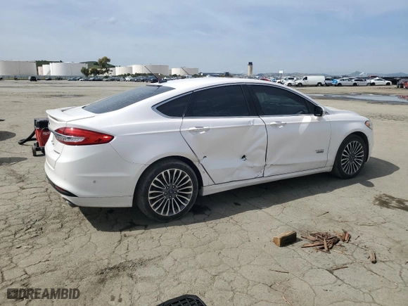 2017 Ford Fusion Energi Titanium with VIN 3FA6P0SUXHR313533, listed as a Copart auction lot 49813215 with 100,698 mi miles and Salvage Title. Bid and sale history available at carsss.com. Image 3.