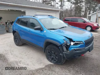 2019 Jeep Cherokee Trailhawk with VIN 1C4PJMBX5KD356050, listed as a IAAI auction lot 41835944 with 65,112 mi miles and . Bid and sale history available at DreamBid. Image 1.