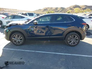 2023 Mazda CX-30 S Select with VIN 3MVDMBBM8PM514475, listed as a IAAI auction lot 41664456 with 33,076 mi miles and . Bid and sale history available at DreamBid. Image 14.