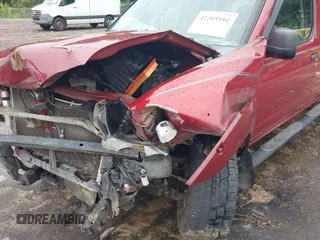 2004 Nissan Frontier XE z VIN 1N6ED29X54C451190, wystawiony jako IAAI lot #42205591 z przebiegiem 136 962 mil mil oraz . Historia ofert i sprzedaży dostępna na DreamBid. Obrazek 16.