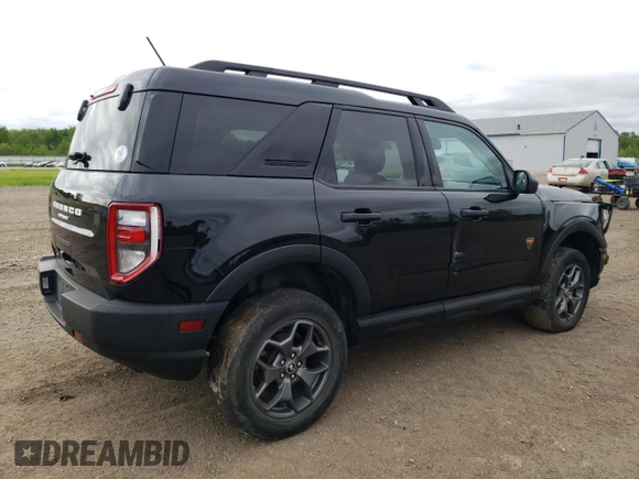 2022 Ford Bronco Sport Badlands z VIN 3FMCR9D9XNRE21095, wystawiony jako Copart lot #57636345 z przebiegiem 60 386 mil mil oraz Szkoda całkowita • Salvage title. Historia ofert i sprzedaży dostępna na DreamBid. Obrazek 3.