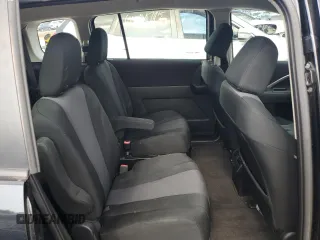 2013 Mazda 5 Sport z VIN JM1CW2BL8D0146019, wystawiony jako Copart lot #60769645 z przebiegiem 119 998 mil mil oraz Czysty tytuł • Clean title. Historia ofert i sprzedaży dostępna na DreamBid. Obrazek 11.