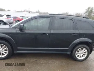 2015 Dodge Journey SXT with VIN 3C4PDDBG5FT639992, listed as a IAAI auction lot 41958496 with 132,410 mi miles and . Bid and sale history available at DreamBid. Image 14.
