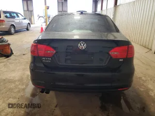 2014 Volkswagen Jetta SE with VIN 3VWD17AJ6EM387167, listed as a Copart auction lot 52251955 with 150,441 mi miles and Salvage title. Bid and sale history available at DreamBid. Image 6.