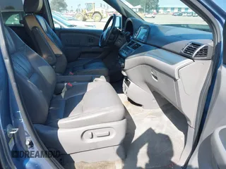 2010 Honda Odyssey Touring with VIN 5FNRL3H92AB056186, listed as a IAAI auction lot 41851386 with 199,109 mi miles. Bid and sale history available at carsss.com. Image 5.