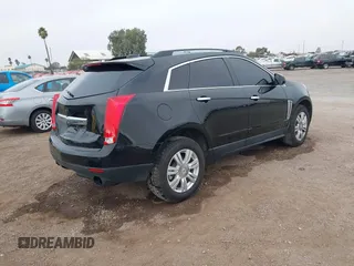 2015 Cadillac SRX with VIN 3GYFNAE37FS598023, listed as a IAAI auction lot 41198546 with 127,373 mi miles and . Bid and sale history available at carsss.com. Image 4.