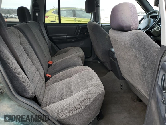 1998 Jeep Grand Cherokee Laredo with VIN 1J4GZ58S5WC285562, listed as a Copart auction lot 89204135 with 0 mi miles and Salvage Title. Bid and sale history available at carsss.com. Image 12.