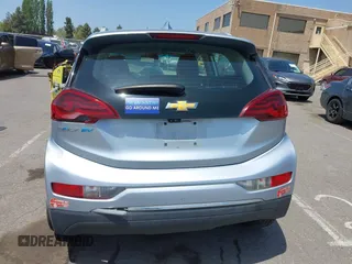 2017 Chevrolet Bolt EV Premier z VIN 1G1FX6S05H4141097, wystawiony jako IAAI lot #42164351 z przebiegiem 93 210 mil mil oraz . Historia ofert i sprzedaży dostępna na DreamBid. Obrazek 15.