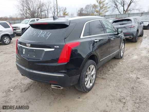 2017 Cadillac XT5 Luxury AWD with VIN 1GYKNDRS2HZ304924, listed as a IAAI auction lot 41736998 with 103,639 mi miles. Bid and sale history available at carsss.com. Image 4.