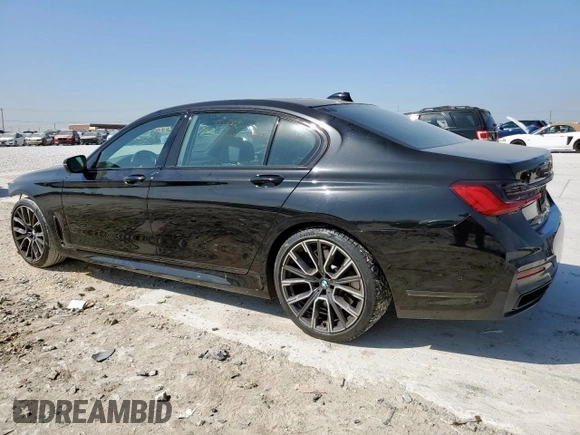 2022 BMW 7 Series 740i with VIN WBA7T2C01NCK41405, listed as a Copart auction lot 50586975 with 45,454 mi miles and Salvage Title. Bid and sale history available at carsss.com. Image 2.