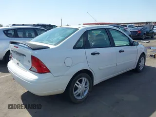 2004 Ford Focus SE z VIN 1FAFP34Z44W103852, wystawiony jako IAAI lot #42395073 z przebiegiem Nie podano mil oraz . Historia ofert i sprzedaży dostępna na DreamBid. Obrazek 4.