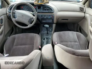 1997 Ford Contour z VIN 3FALP6536VM113346, wystawiony jako Copart lot #70036024 z przebiegiem 115 084 mil mil oraz Tytuł czysty. Historia ofert i sprzedaży dostępna na DreamBid. Obrazek 8.