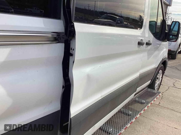 2020 Ford Transit Passenger XL with VIN 1FDAX2C86LKA63962, listed as a IAAI auction lot 42708190 with 27,261 mi miles and . Bid and sale history available at DreamBid. Image 1.
