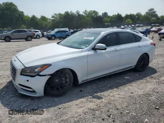 2018 Genesis G80 3.8L z VIN KMHGN4JEXJU245900, wystawiony jako Copart lot #60552515 z przebiegiem 107 502 mil mil oraz Szkoda całkowita • Salvage title. Historia ofert i sprzedaży dostępna na DreamBid. Obrazek 1.