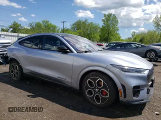 2022 Ford Mustang Mach-E GT z VIN 3FMTK4SE6NMA31440, wystawiony jako Copart lot #55771295 z przebiegiem 29 176 mil mil oraz Szkody całkowita. Historia ofert i sprzedaży dostępna na DreamBid. Obrazek 4.