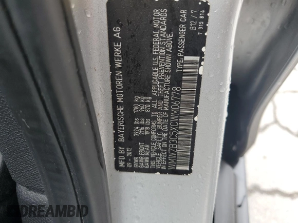 2012 MINI Countryman with VIN WMWZB3C5XCWM06778, listed as a Copart auction lot 61201285 with 64,676 mi miles and Salvage title. Bid and sale history available at DreamBid. Image 12.