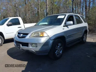 2004 Acura MDX Touring Pkg with VIN 2HNYD18694H521669, listed as a IAAI auction lot 42040542 with 294,325 mi miles. Bid and sale history available at carsss.com. Image 2.