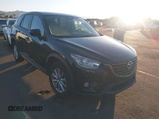 2016 Mazda CX-5 Touring with VIN JM3KE2CY5G0704574, listed as a IAAI auction lot 41033546 with 133,502 mi miles. Bid and sale history available at carsss.com. Image 1.