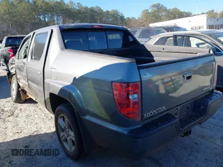 2010 Honda Ridgeline RTL with VIN 5FPYK1F52AB004678, listed as a IAAI auction lot 41661968 with 169,021 mi miles. Bid and sale history available at carsss.com. Image 3.