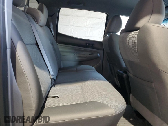 2014 Toyota Tacoma z VIN 3TMMU4FN4EM071741, wystawiony jako Copart lot #49235015 z przebiegiem 60 825 mil mil oraz Szkoda całkowita • Salvage title. Historia ofert i sprzedaży dostępna na DreamBid. Obrazek 10.