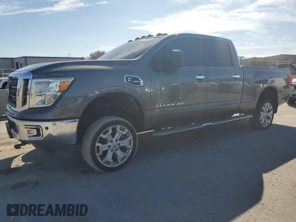 2016 Nissan Titan XD PRO-4X with VIN 1N6BA1F47GN510491, listed as a Copart auction lot 77826454 with 102,285 mi miles and Clean Title. Bid and sale history available at carsss.com. Image 1.